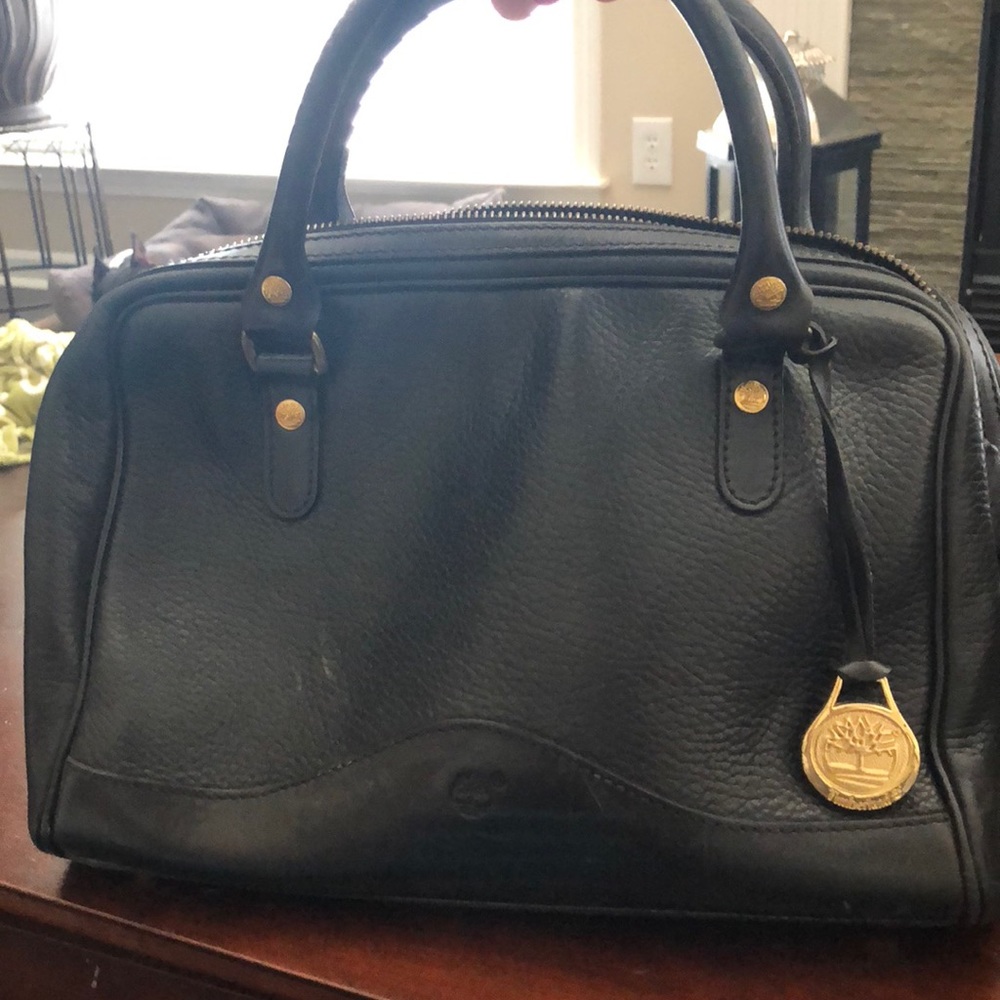Timberland black and gold purse